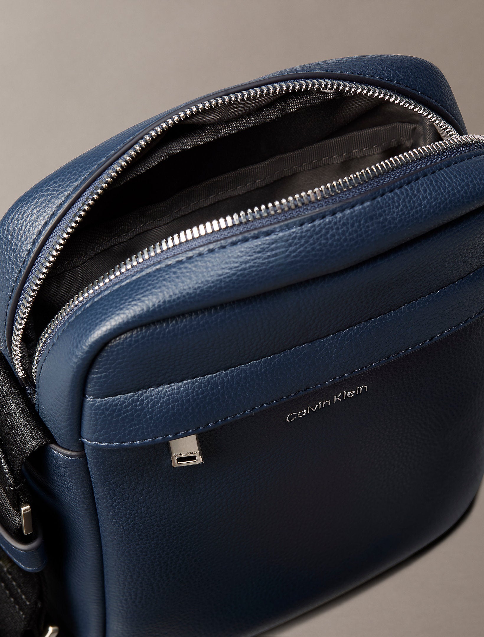 Calvin Klein Raised Reporter Bag