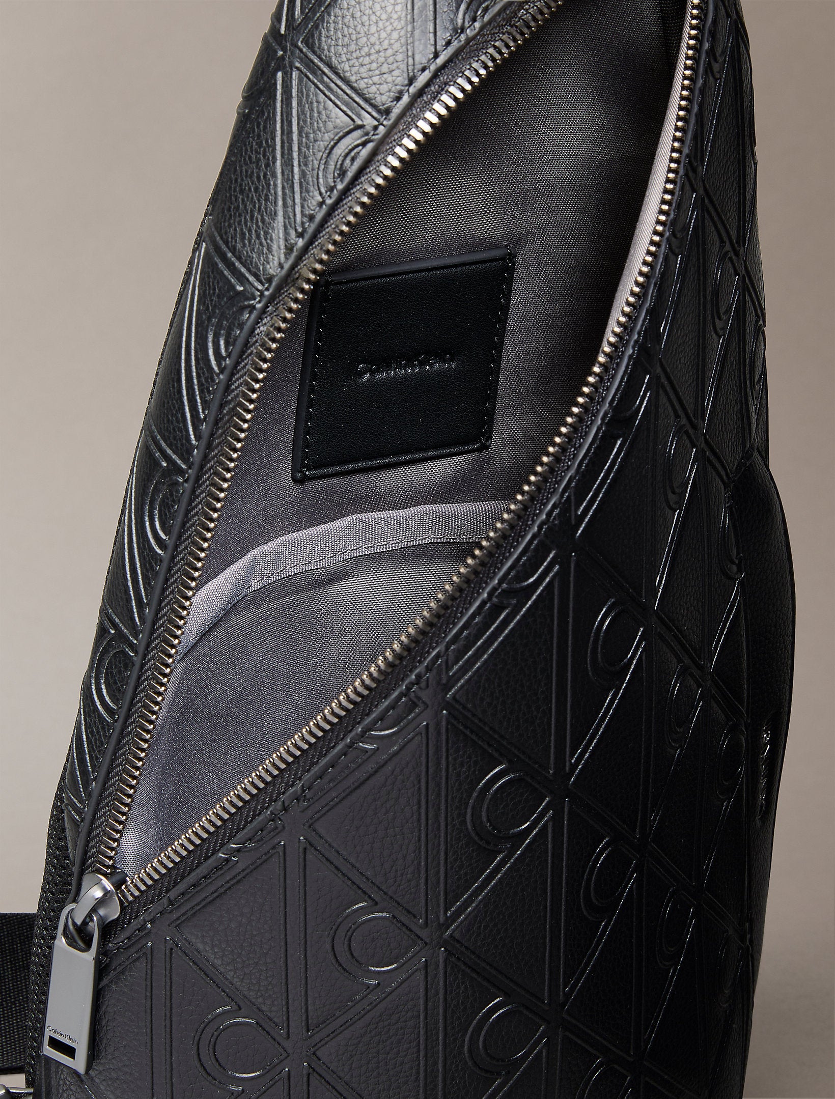Calvin Klein Emblem Aop Deboss Ns Sling Bag