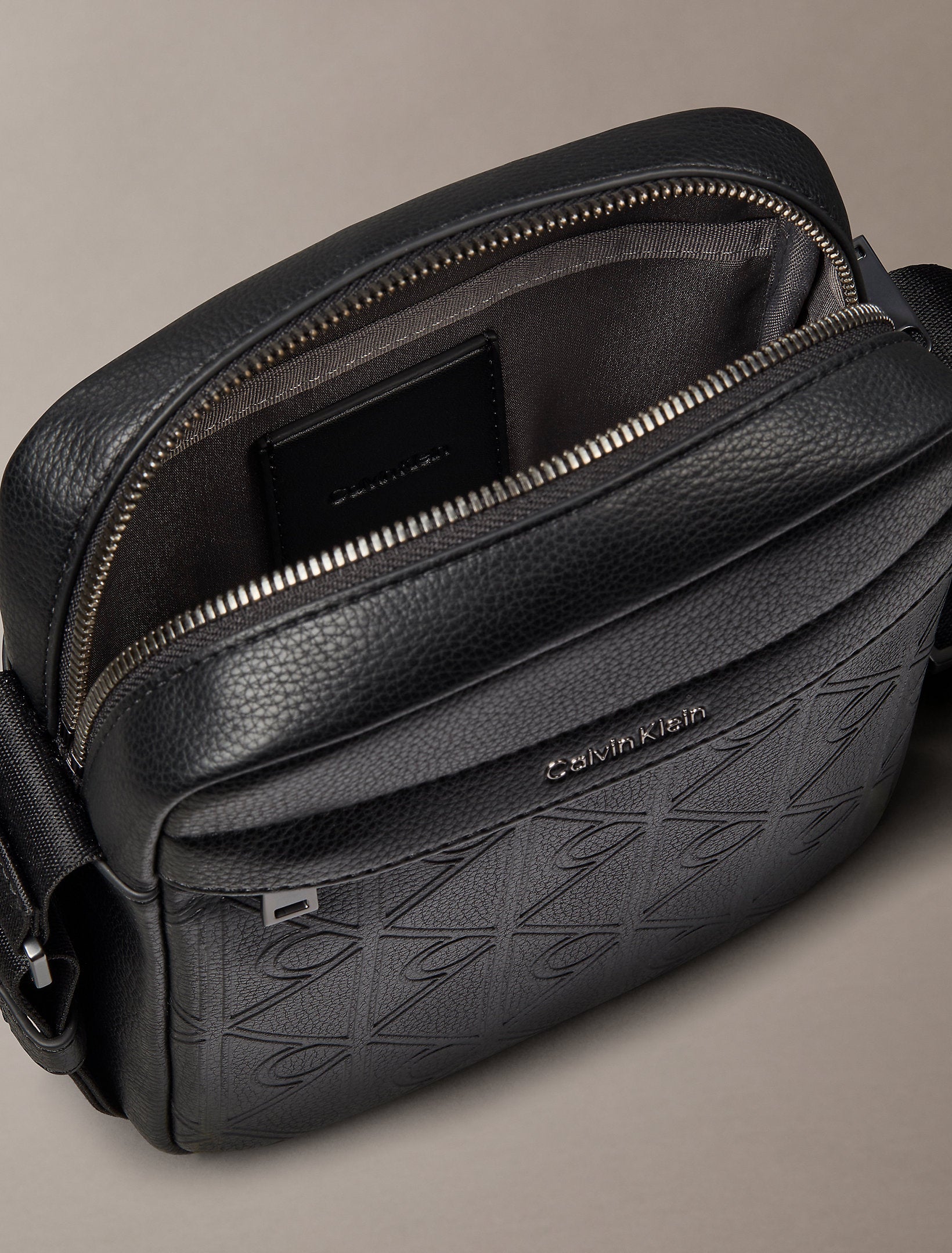 Calvin Klein Emblem Aop Deboss Reporter Bag