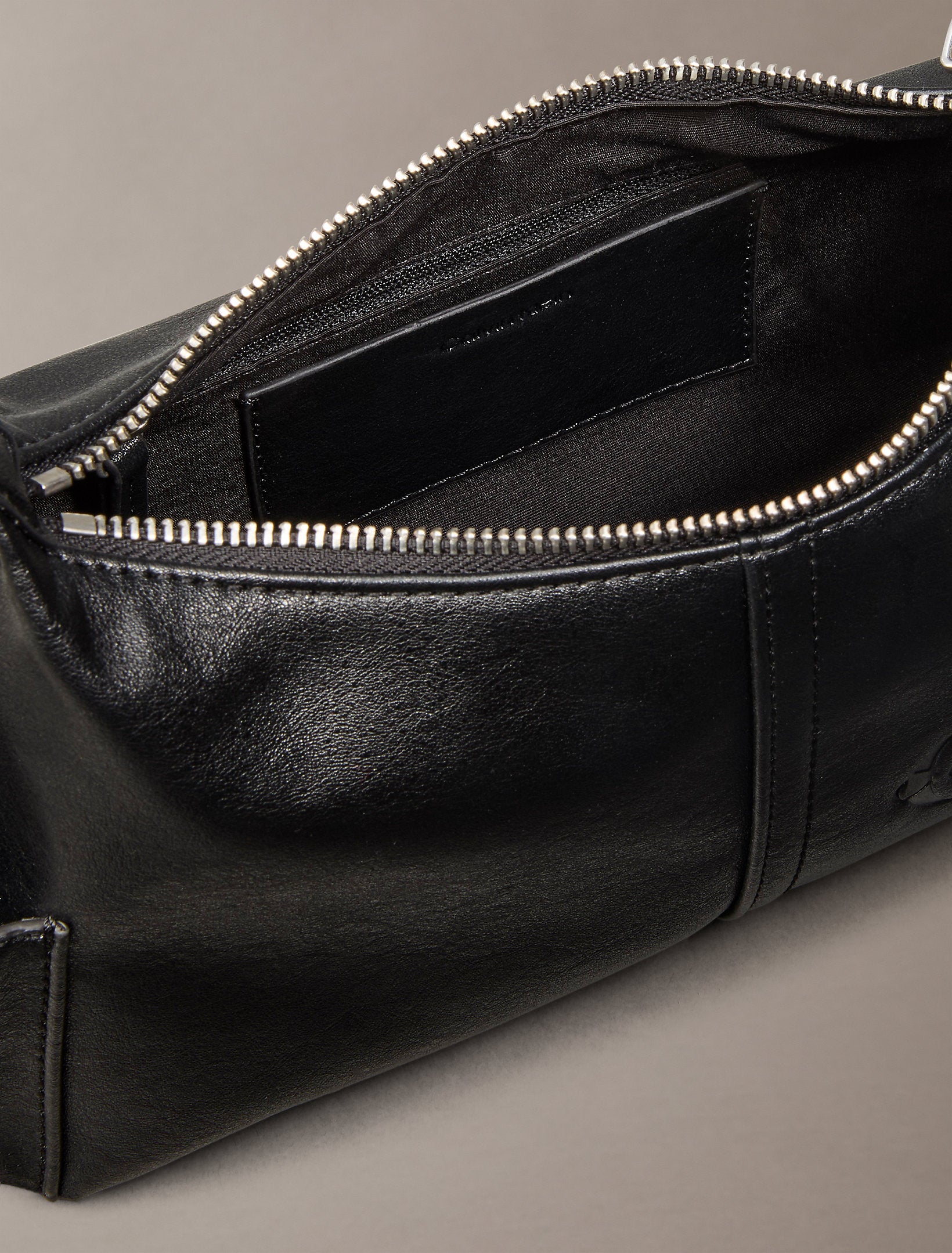 Calvin Klein Pockets Monologo Crossbody Bag