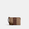 محفظة كوتش Corner Zip Wristlet In Signature Canvas With Stripe